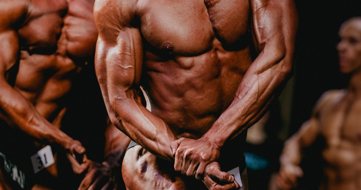 A group of bodybuilders on stage