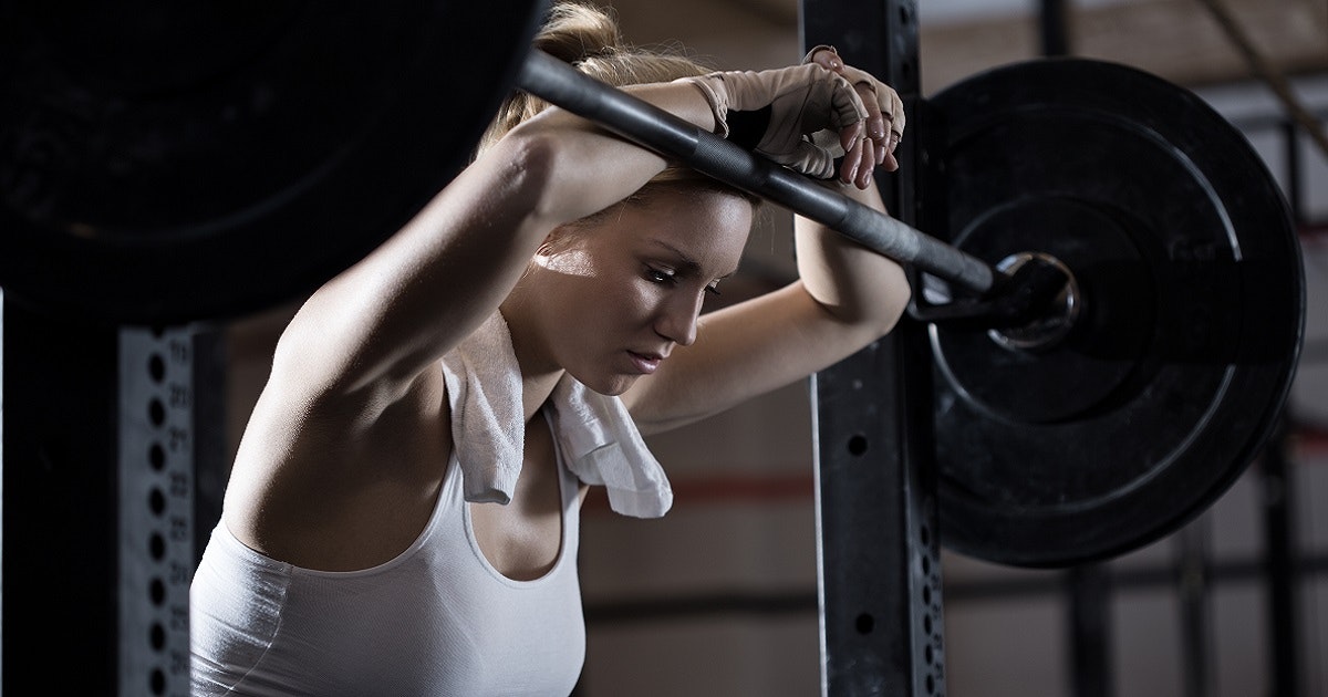 Fatigued women after weight lifting