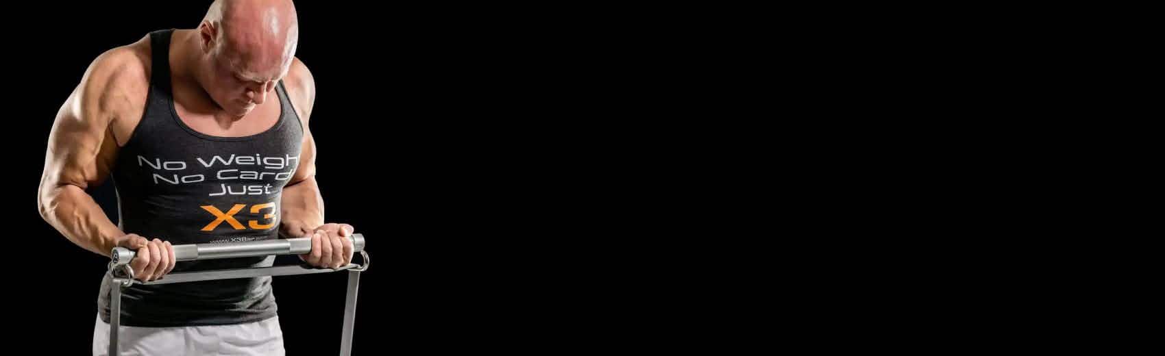 Doctor Jaquish doing bicep curls with X3 Bar