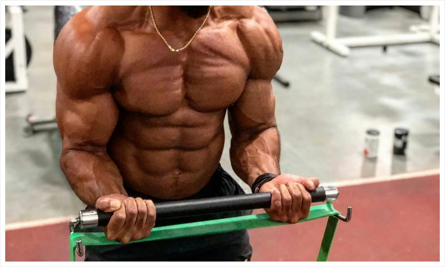 Man doing bicep curls with resistance band and bar
