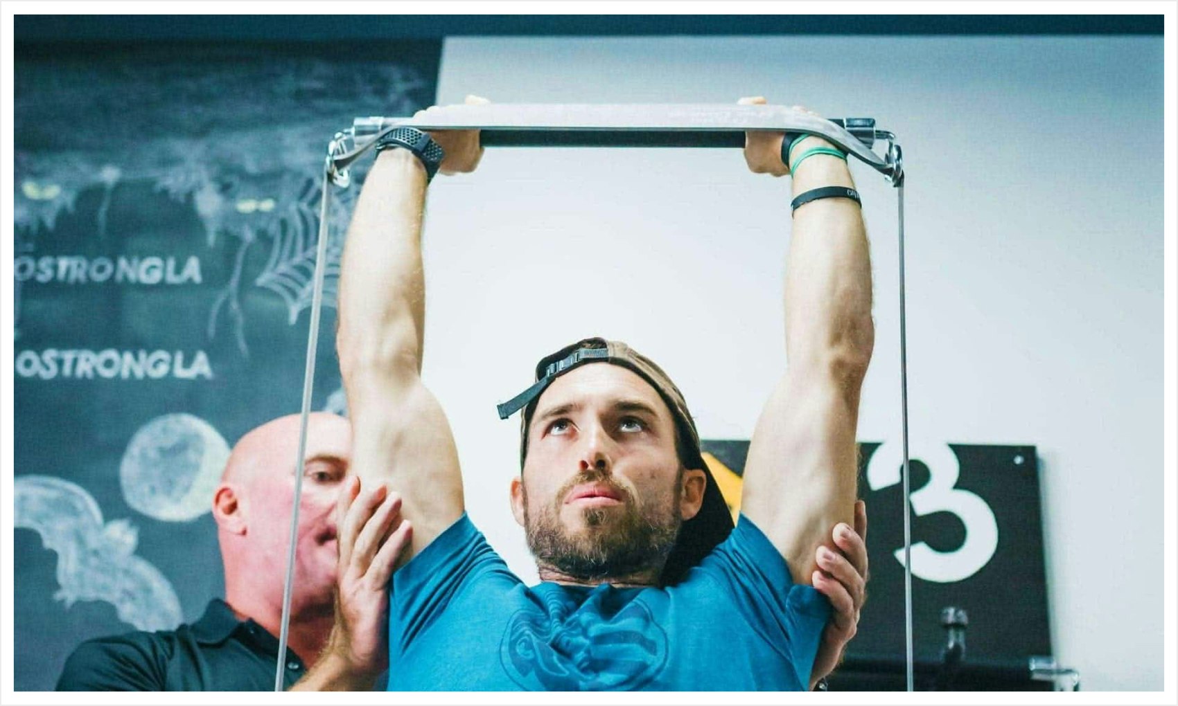 Man doing shoulder press with X3