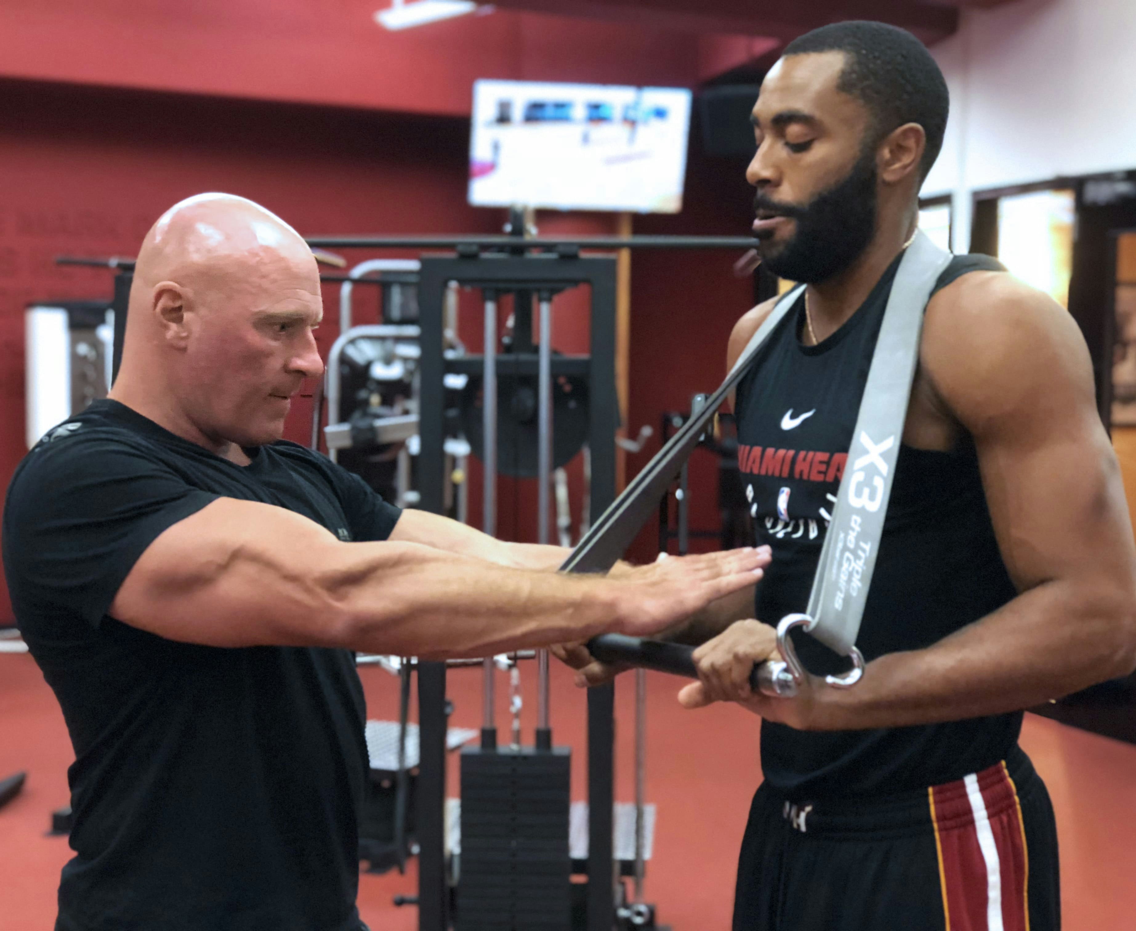 John Jaquish showing how to perform an exercise