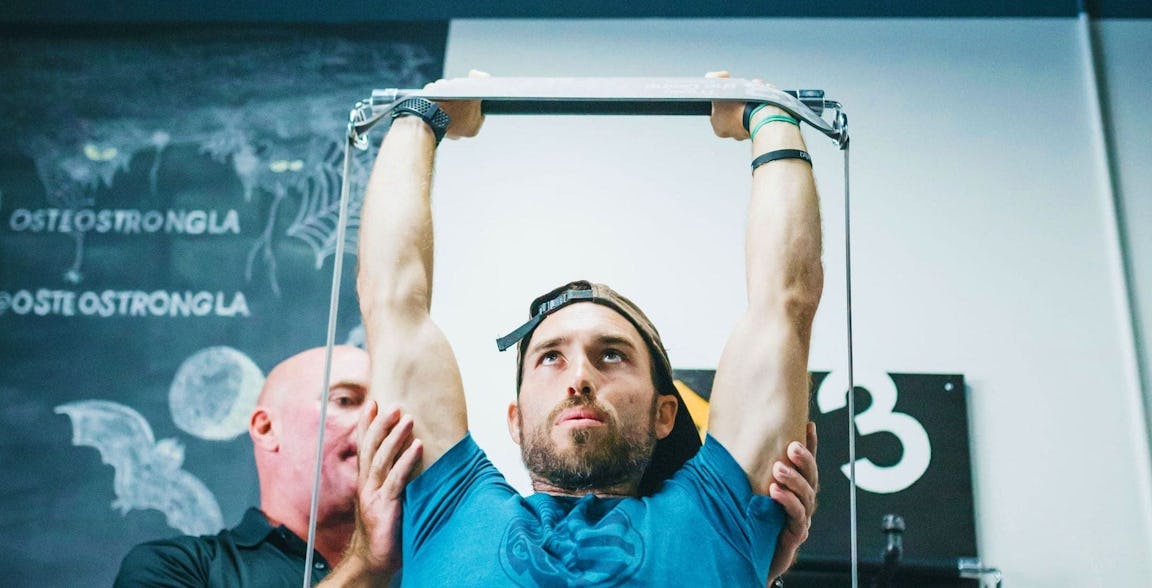 Dr. John Jaquish doing X3 bicep curl