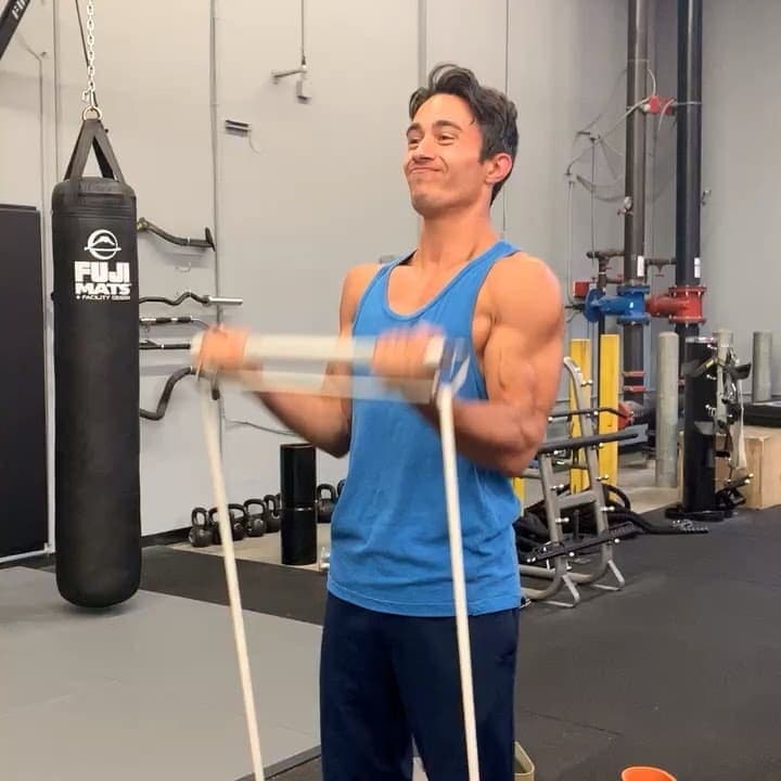 Man doing bicep curl with X3