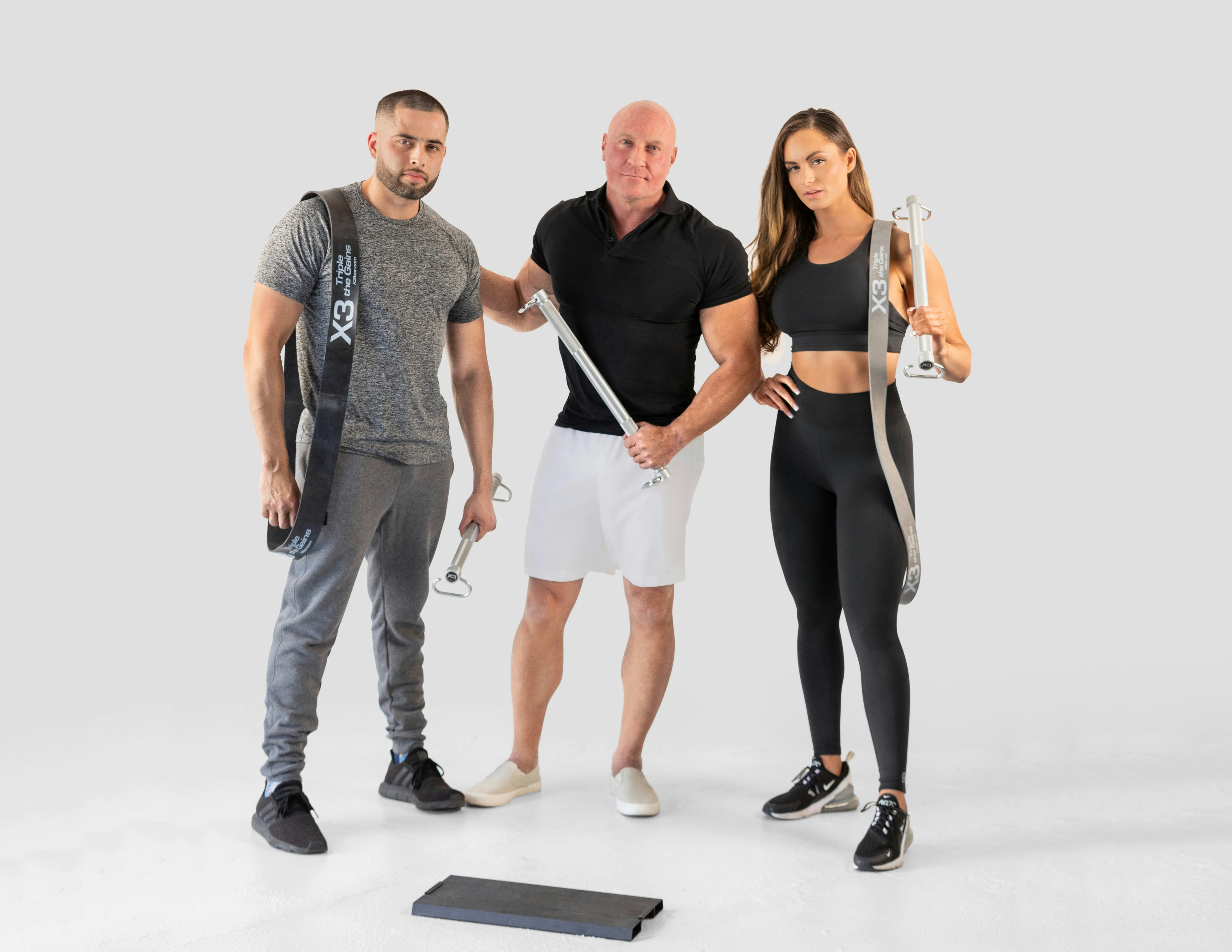 John and 2 fitness models show of the X3 Bar System
