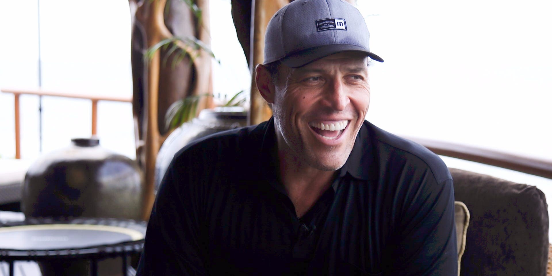 Tony Robbins starts every morning with an 'adrenal support cocktail,' a 'priming' meditation exercise, and a workout involving a 'torture machine'