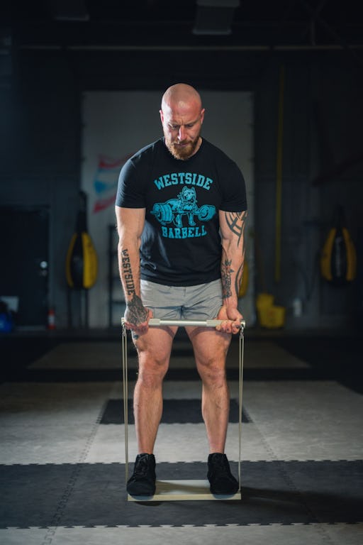Craig performing an X3 bicep curl