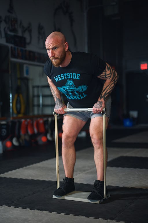 Craig performing an X3 bicep curl