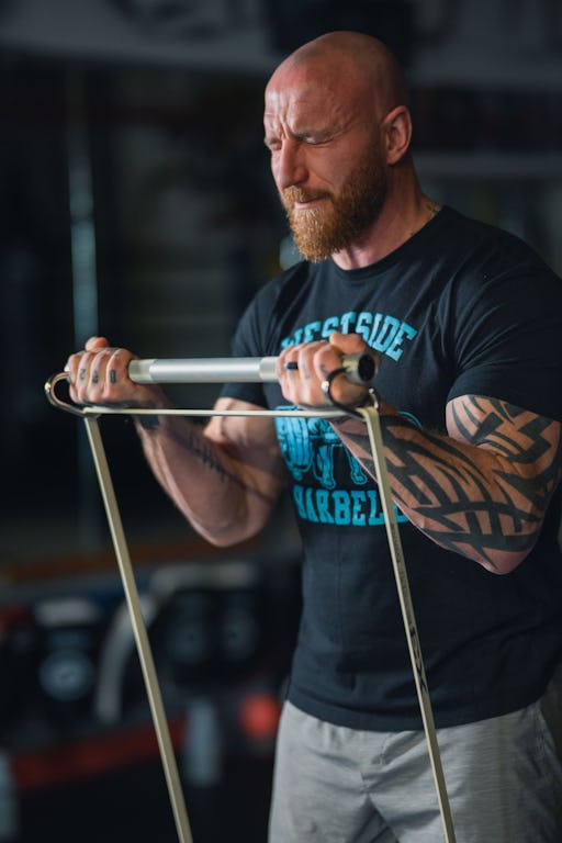 Craig performing an X3 bicep curl